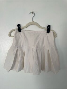 Urban Romantics cream pleated mini skirt size small 100% cotton